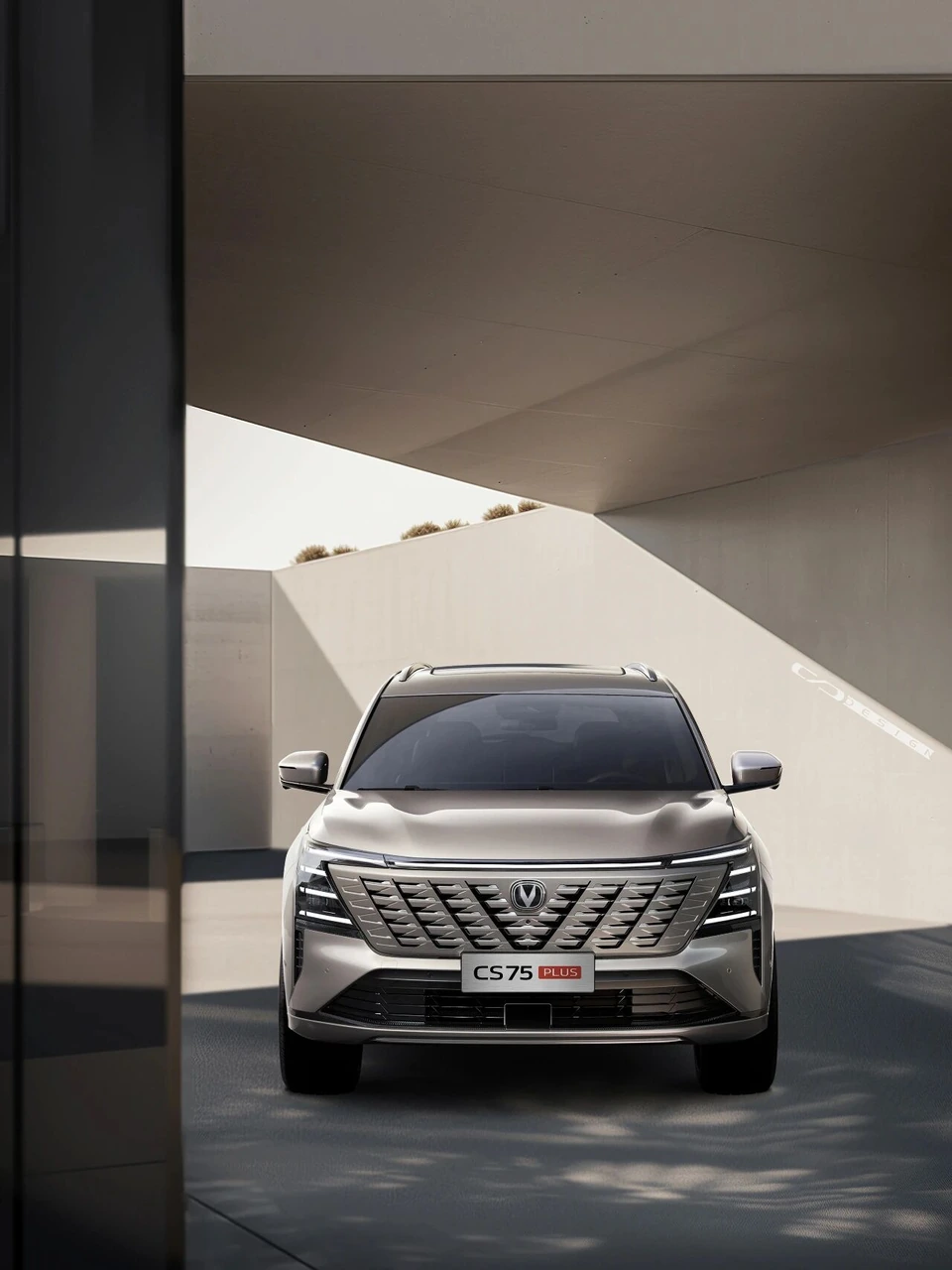 Changan CS75 Plus — front view framed by architecture